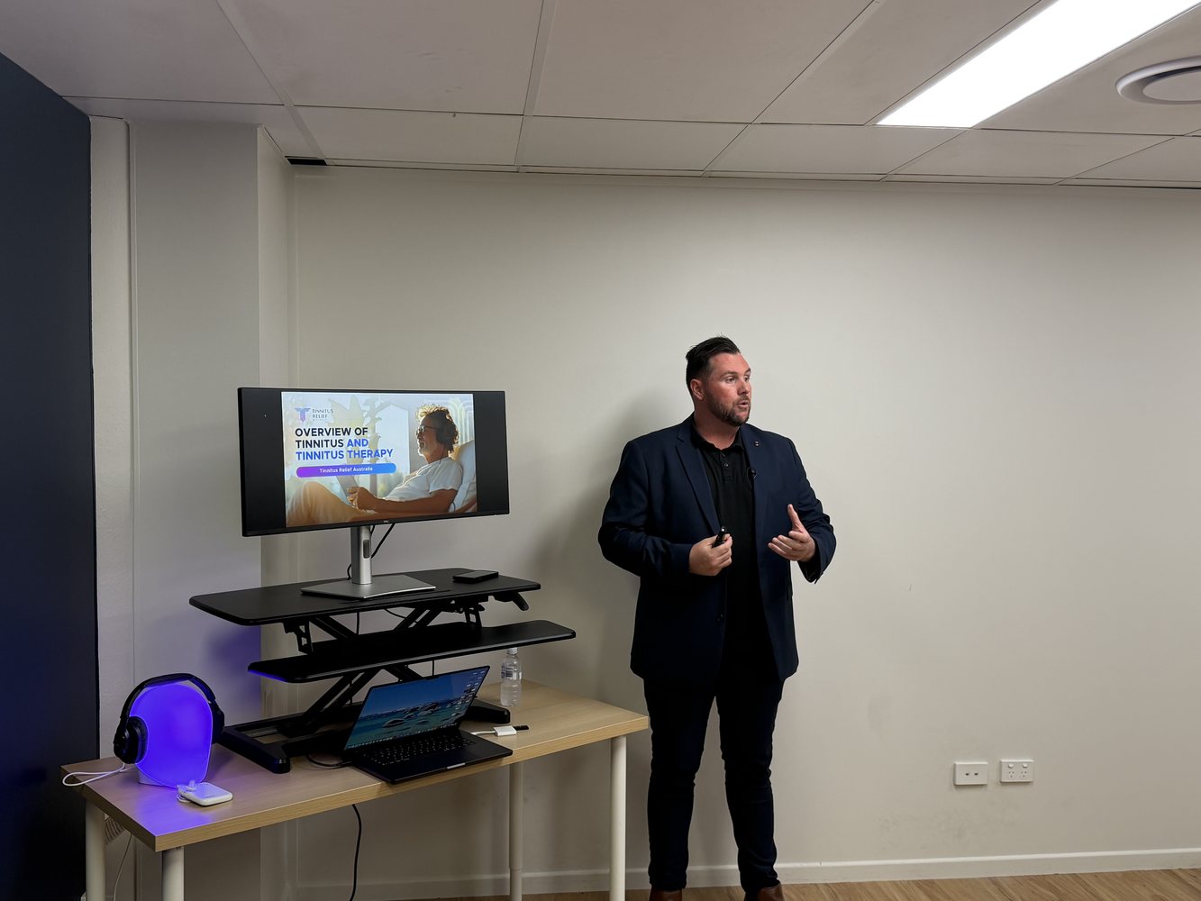 Jamie presenting at a GP education evening